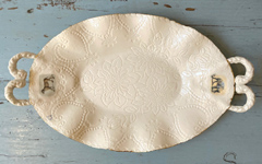Joke Schole, Ovale schaal met oren, Porcelein, 28x20 cm, €.80,-