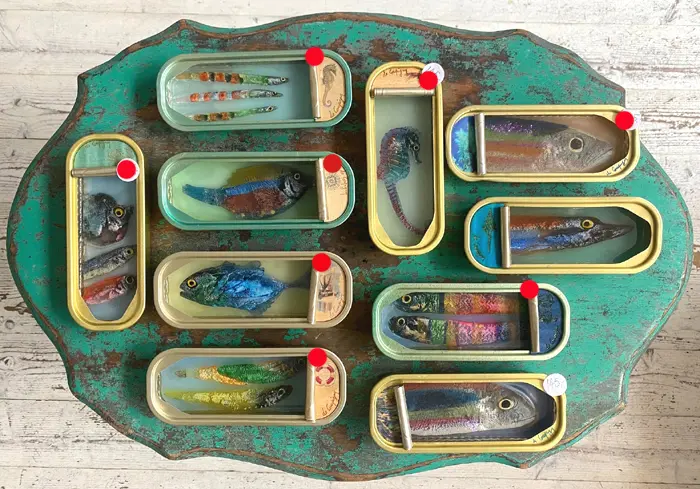 Ortaire de Coupigny, Small elongated fishtins, 145 euro, Mixed media in original fish tin.