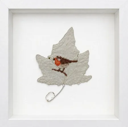 Renee Toonen, Roodborst op zilverberk, 225 euro, Cross-stitches on dried silver birch in white frame, 30x30x5 cm